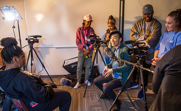 student being interviewed on camera